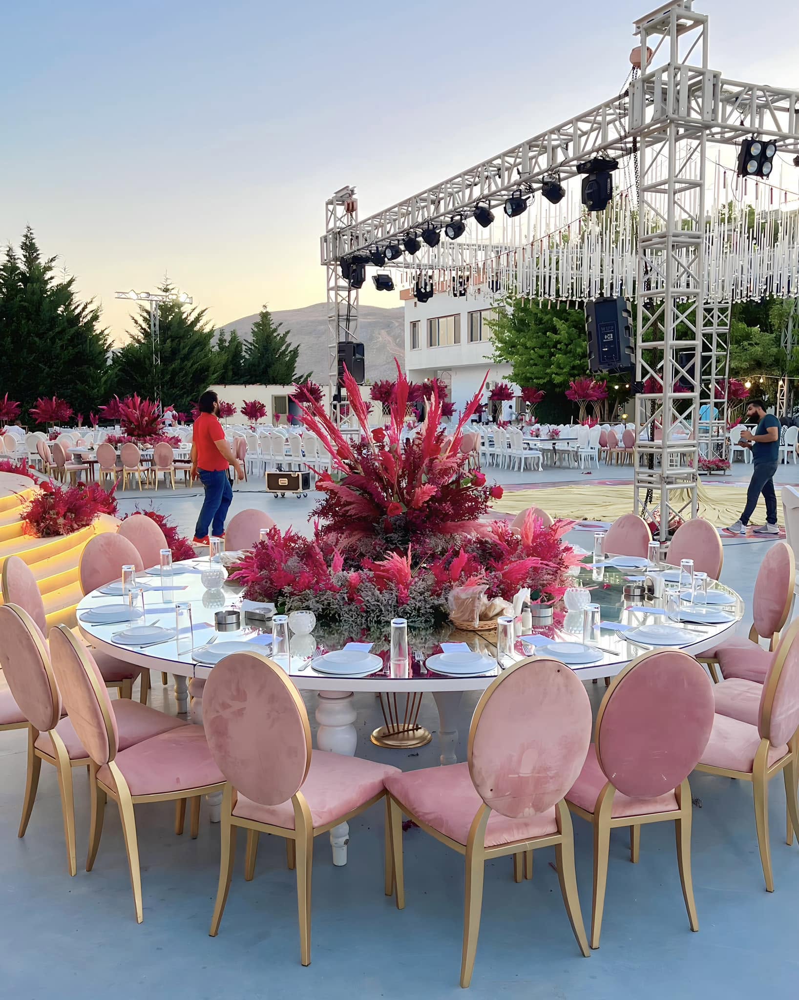 Pink reception tables at sunset